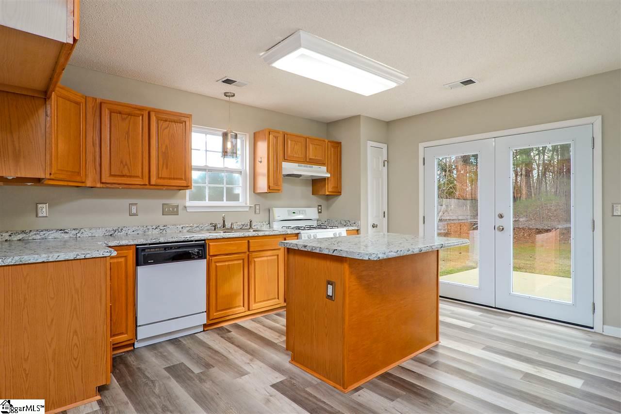 512 Garrett Street Fountain Inn, SC 29644 - Photo 6 of 25 New countertops - New flooring - New paint