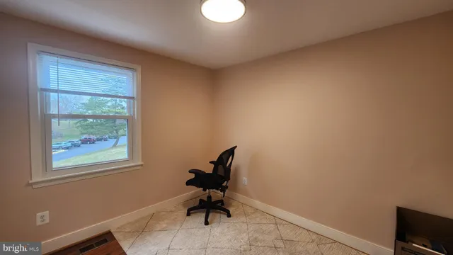 a room with workbench and window