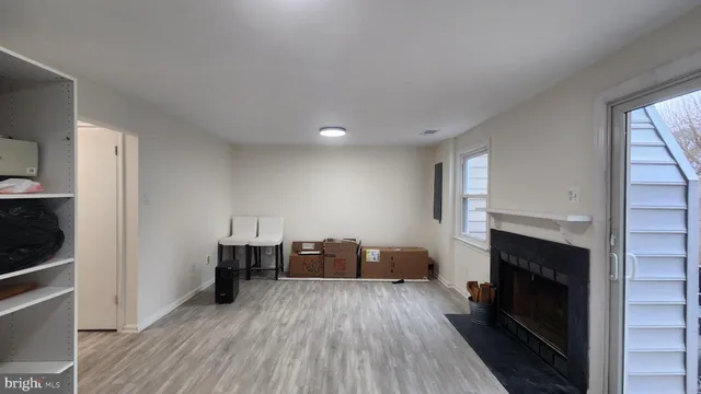 a view of livingroom with furniture and fireplace
