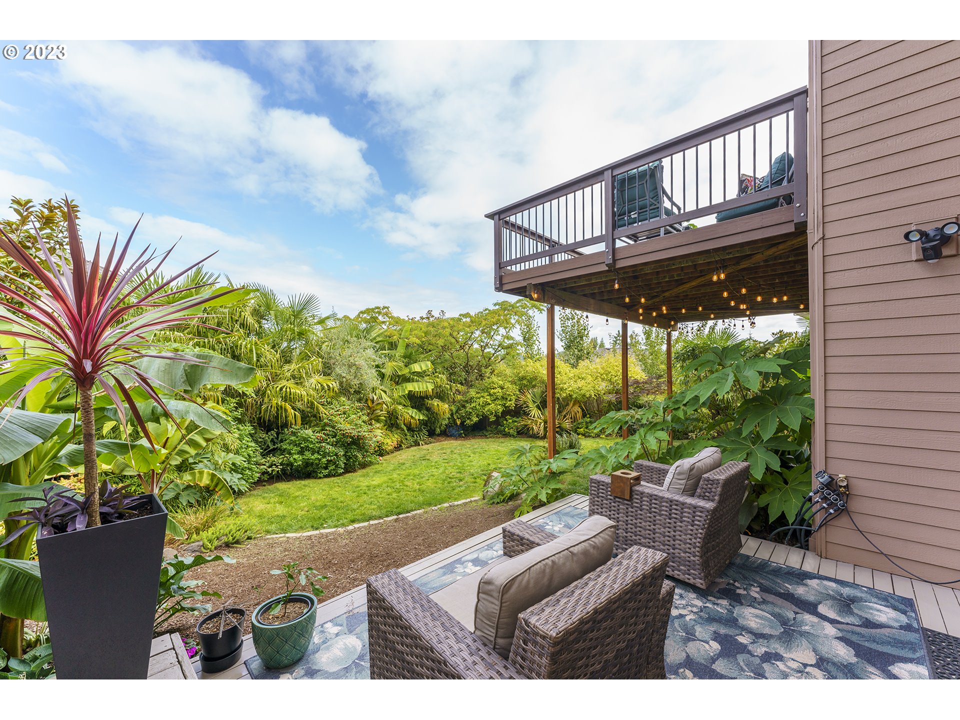 11561 Southeast Highland Loop Clackamas, OR 97015 - Photo 30 of 36 a view of yard with patio