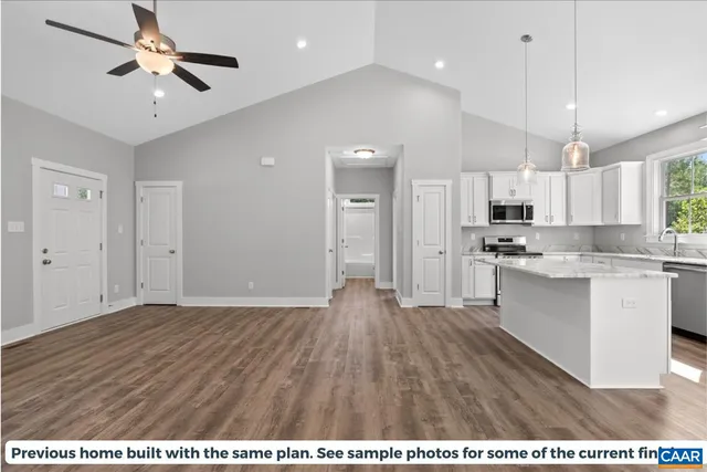 a view of kitchen with wooden floor