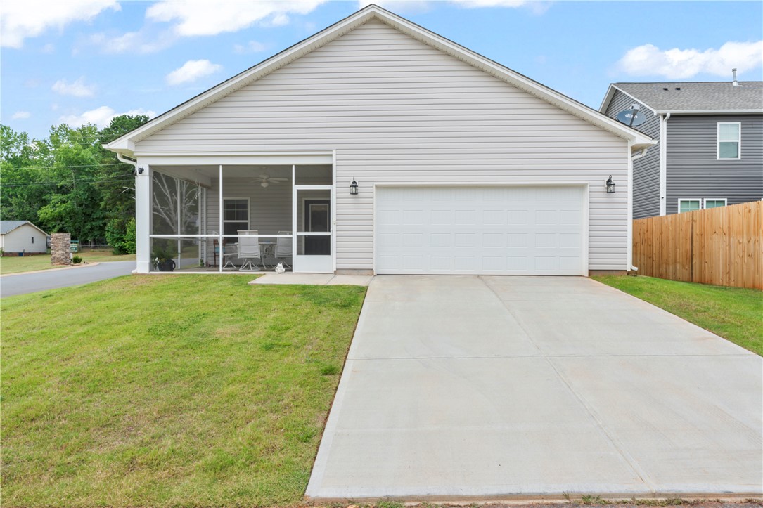 1044 Fairfield Drive Seneca, SC 29678 - Photo 5 of 46 2 car garage with entrance to the porch and the home.