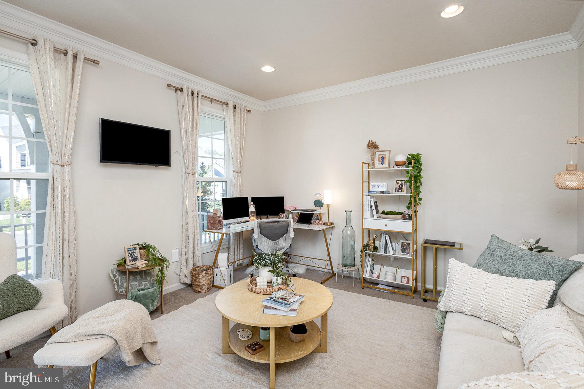 1040 Aspen Road Stafford, VA 22554 - Photo 19 of 51 a living room with furniture and a flat screen tv