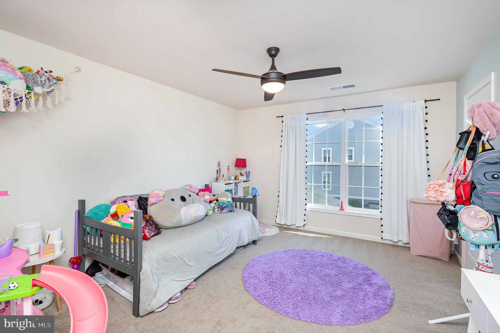 1040 Aspen Road Stafford, VA 22554 - Photo 28 of 51 a bedroom with furniture and a rug