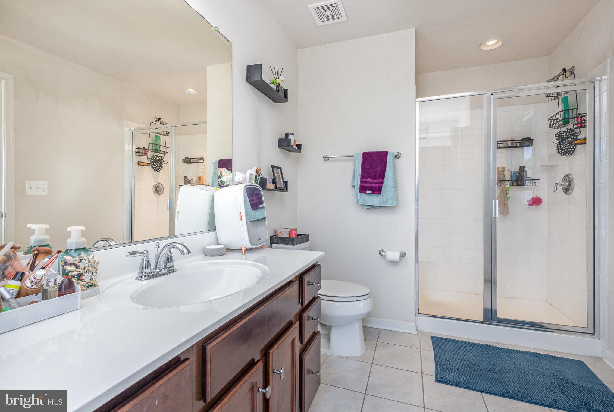1040 Aspen Road Stafford, VA 22554 - Photo 33 of 51 a bathroom with a sink toilet and shower