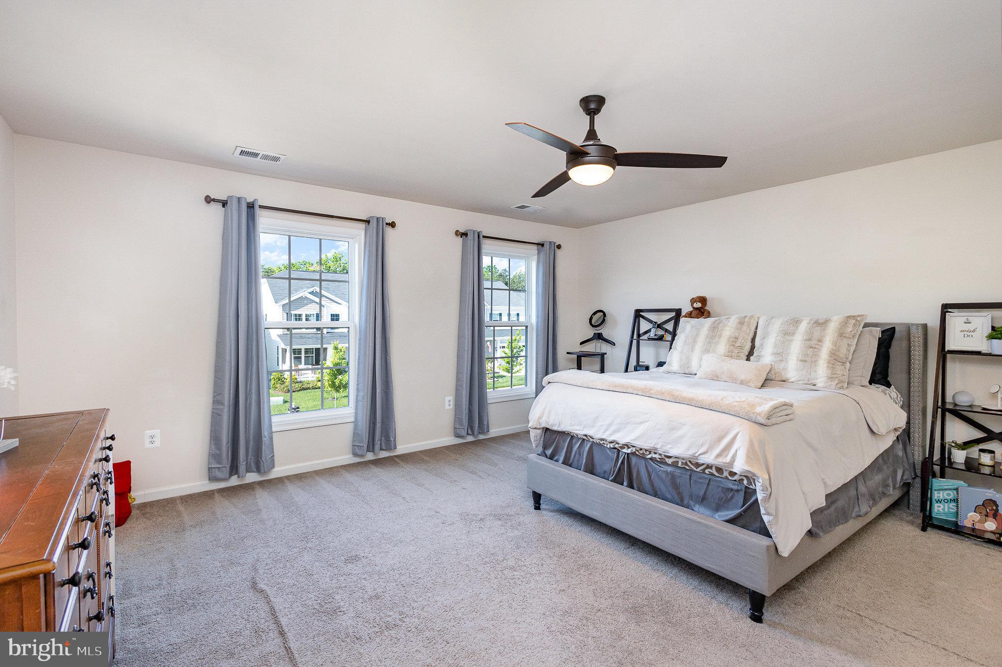 1040 Aspen Road Stafford, VA 22554 - Photo 34 of 51 a spacious bedroom with a bed and a window