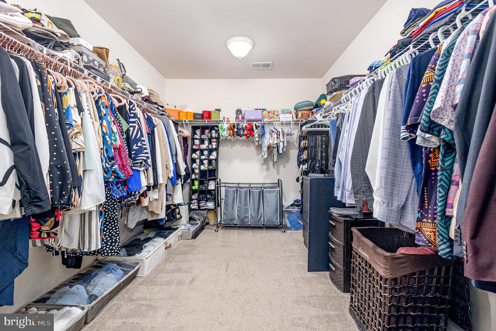 1040 Aspen Road Stafford, VA 22554 - Photo 38 of 51 a view of walk in closet with clothes