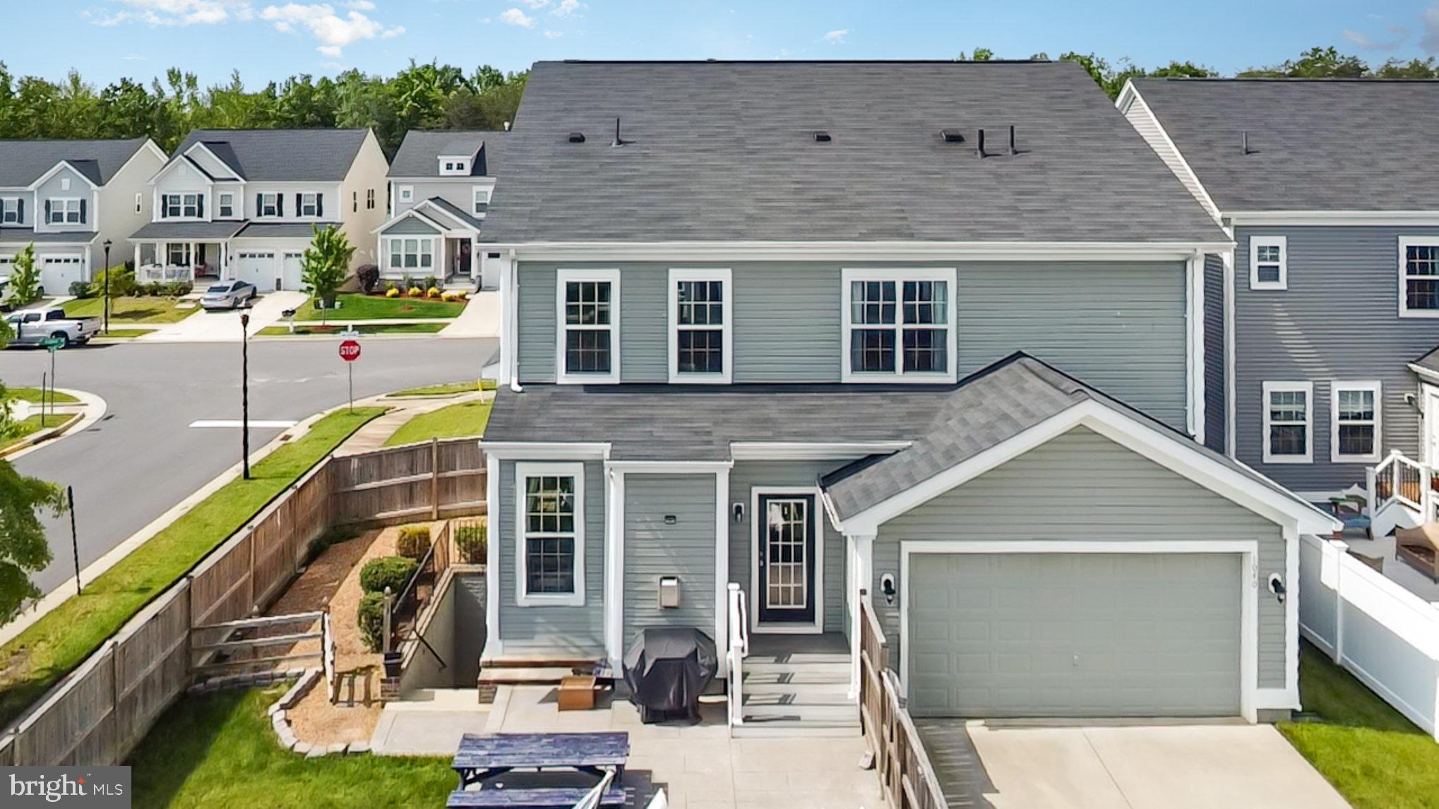 1040 Aspen Road Stafford, VA 22554 - Photo 7 of 51 a front view of a house with garden