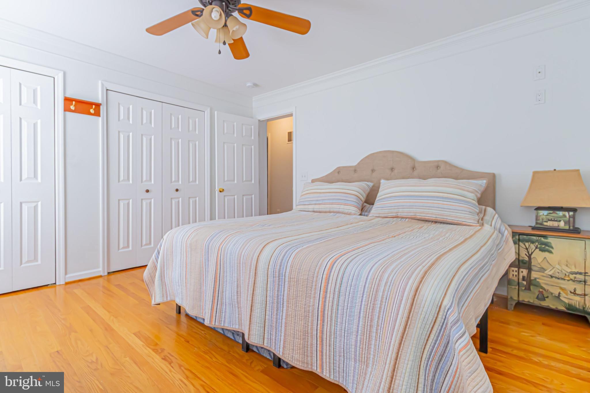 903 Oakdene Road Middle River, MD 21220 - Photo 19 of 47 a bedroom with a bed and a chandelier