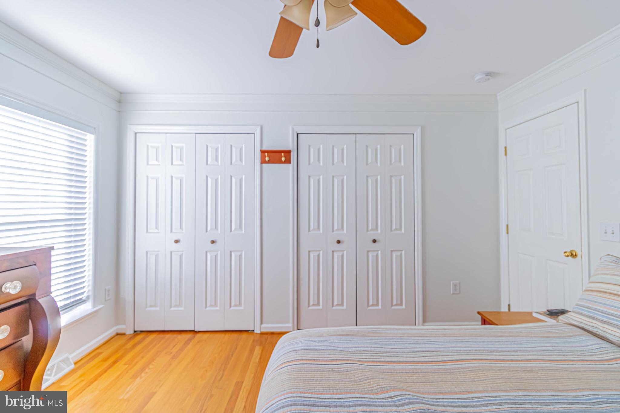 903 Oakdene Road Middle River, MD 21220 - Photo 20 of 47 a view of a bedroom with wooden floor and bathroom