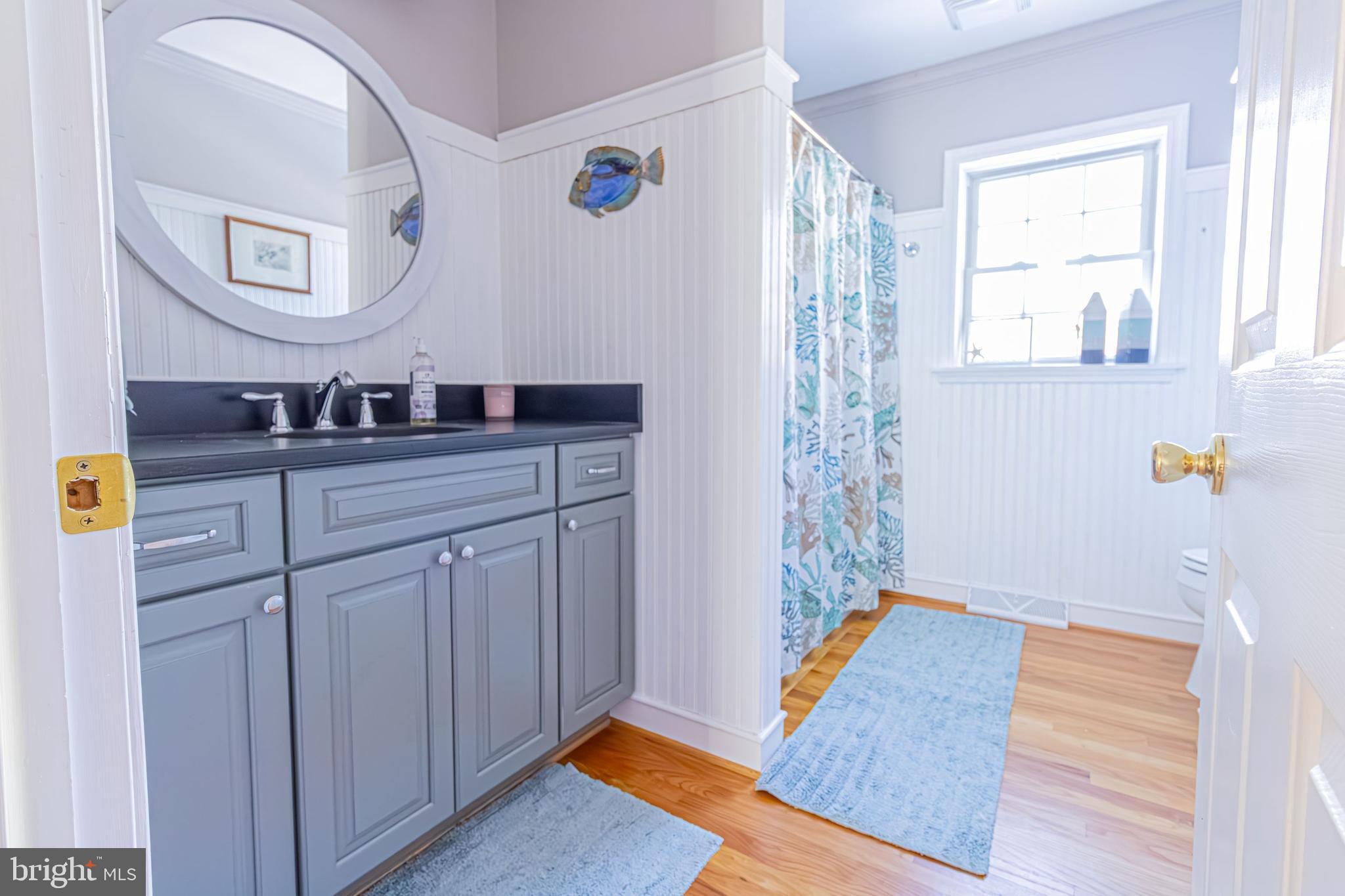 903 Oakdene Road Middle River, MD 21220 - Photo 24 of 47 a bedroom with a bed and a cabinets