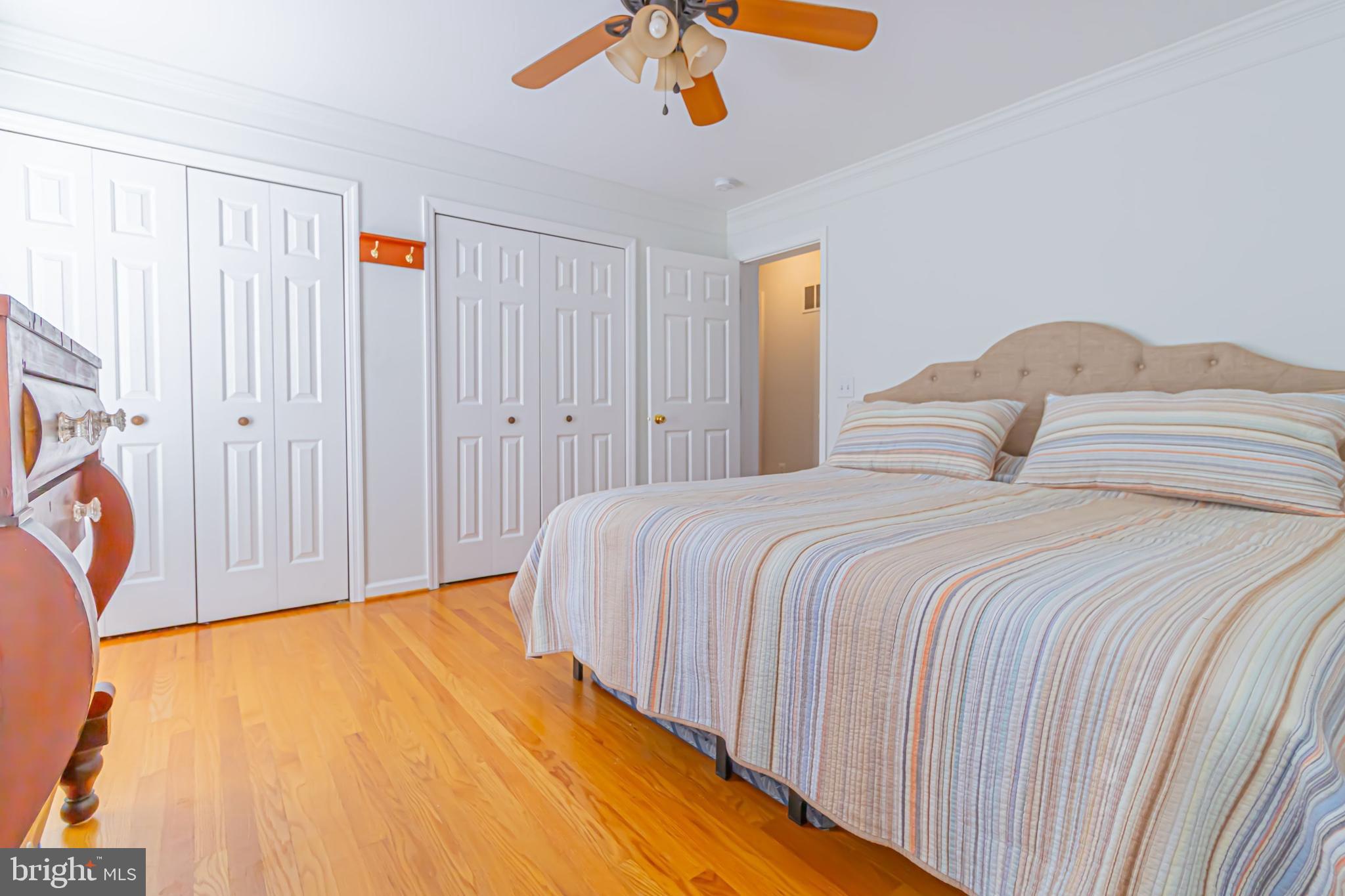 903 Oakdene Road Middle River, MD 21220 - Photo 43 of 47 a bedroom with a bed and a chandelier