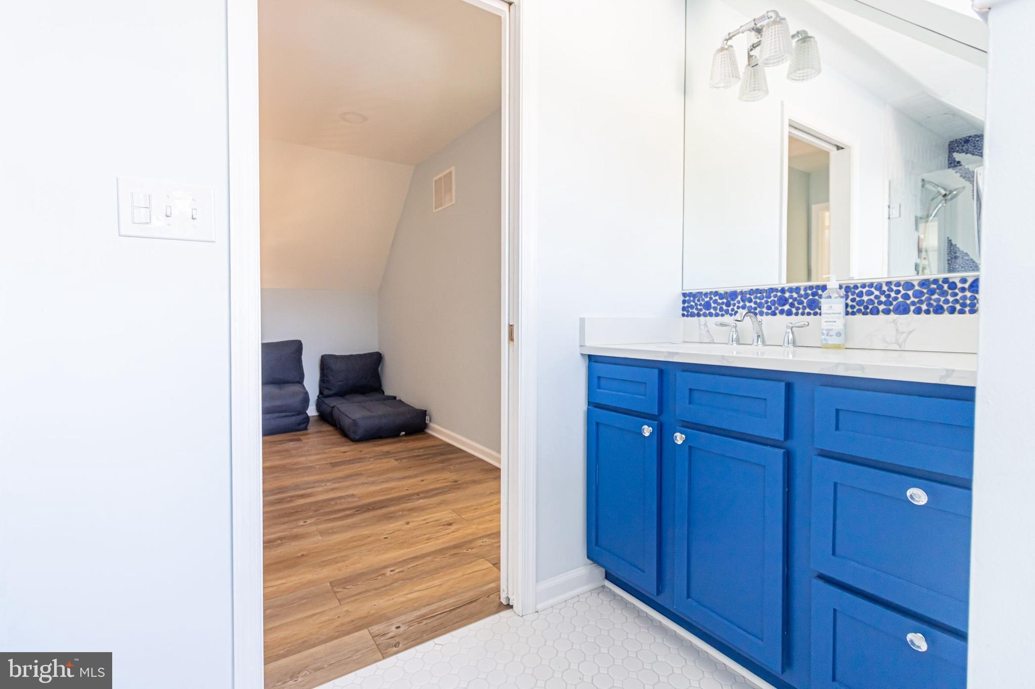 903 Oakdene Road Middle River, MD 21220 - Photo 45 of 47 a bathroom with a sink and a mirror