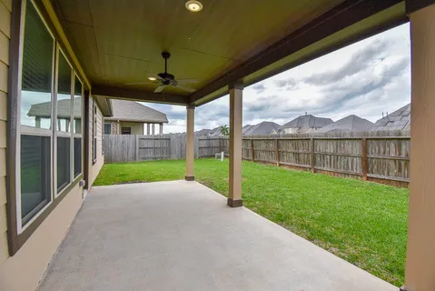 a view of a porch with a backyard