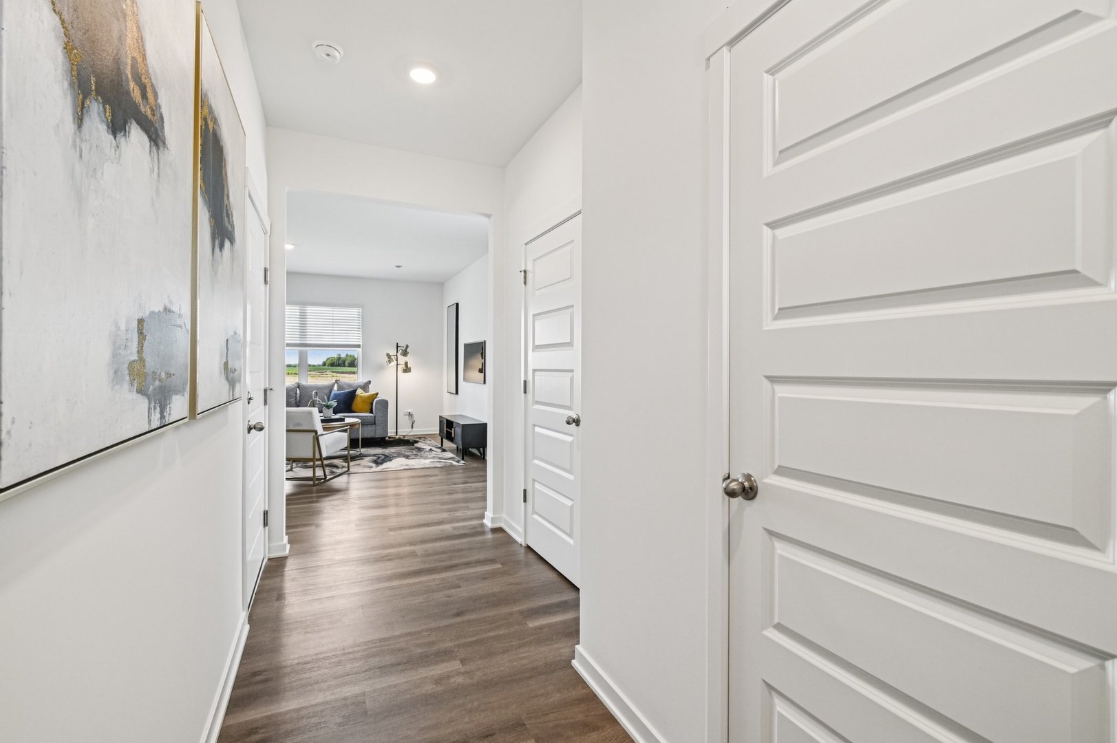 2417 Semillon Street Oswego, IL 60543 - Photo 3 of 45 a living room with furniture and a wooden floor