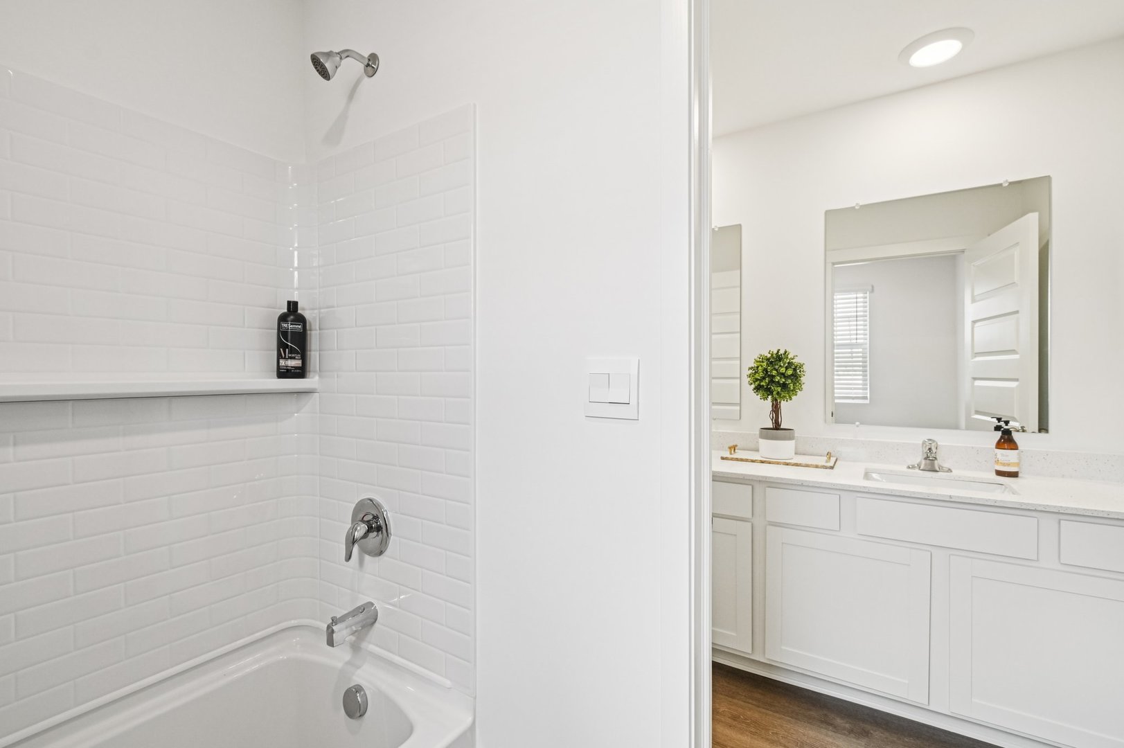 2417 Semillon Street Oswego, IL 60543 - Photo 40 of 45 a bathroom with a sink and a bathtub