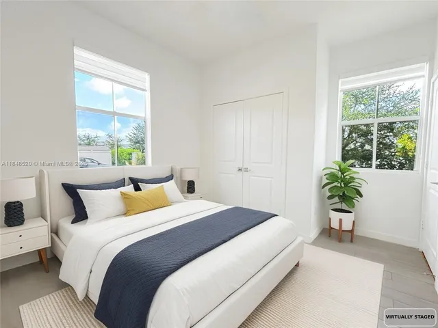 a view of a hallway with stairs