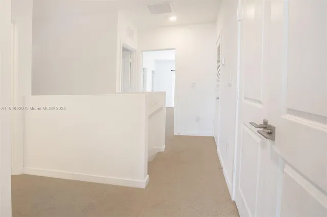 a bathroom with a double vanity sink toilet and shower
