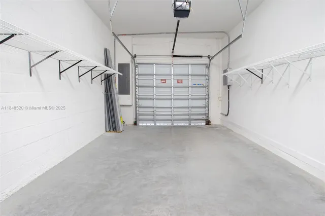 a view of a house with swimming pool and sitting area