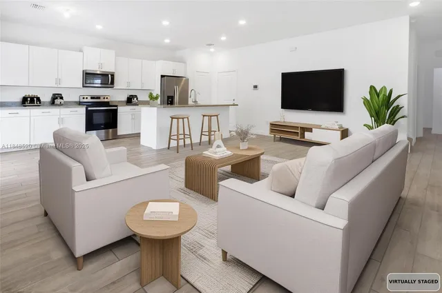 a bedroom with bed and a window