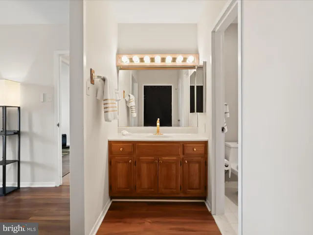 a view of living room with granite countertop furniture and a fireplace