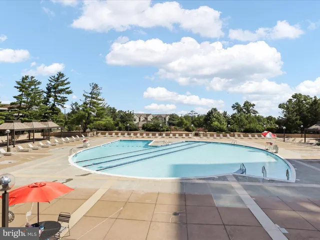 a front view of a building with garden