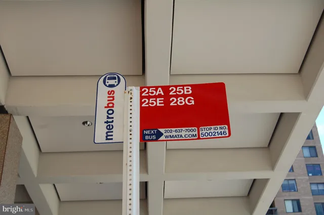 a sign that is sitting on a wooden floor