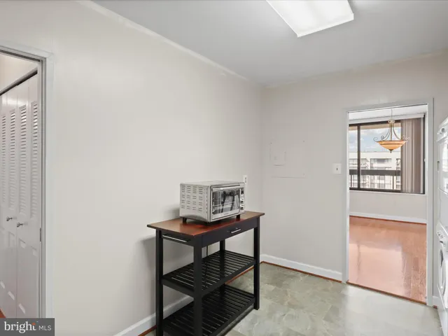 a view of a workspace with furniture