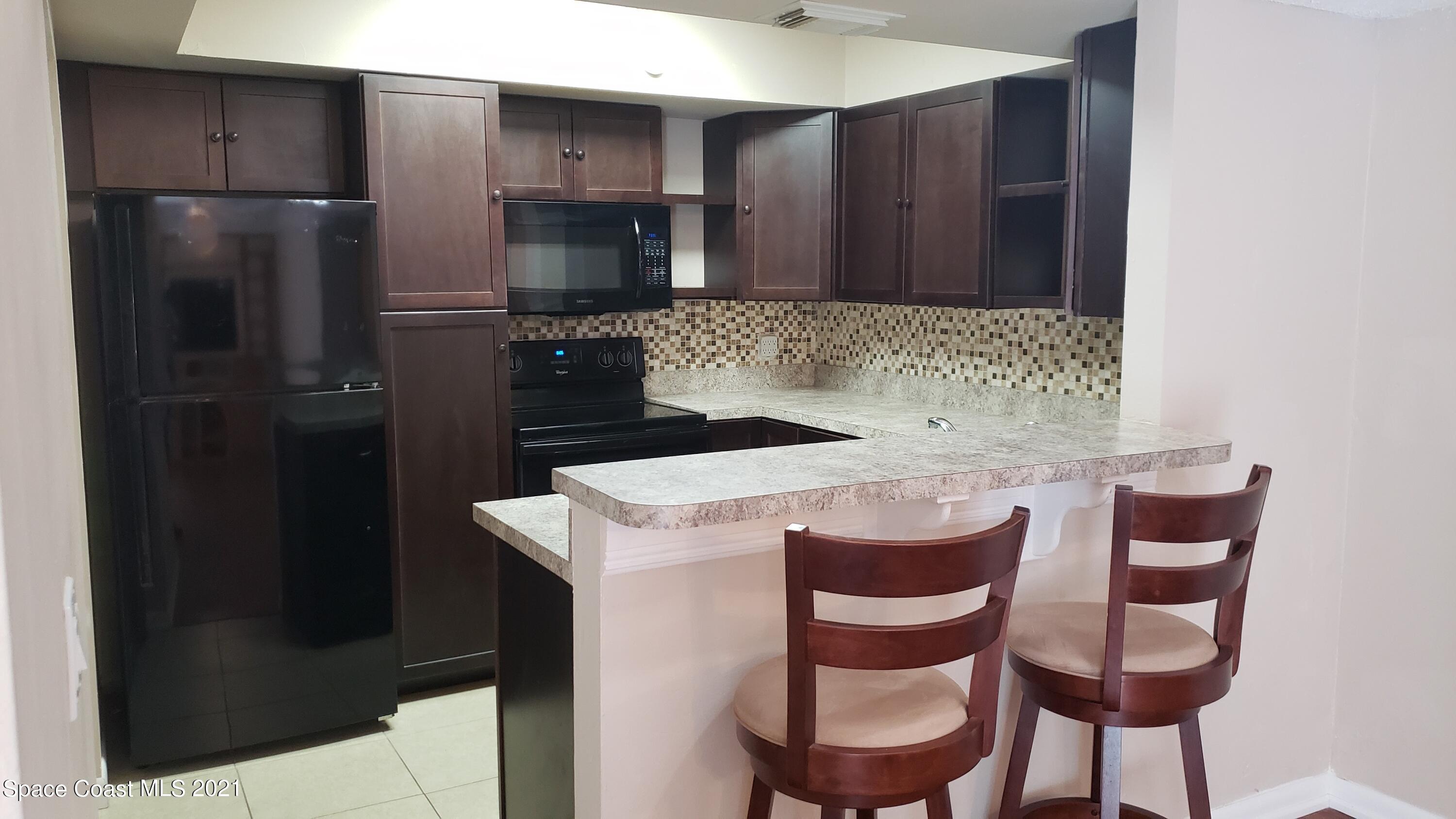 653 Ridge Club Drive, Unit 27 Melbourne, FL 32934 - Photo 2 of 31 Kitchen