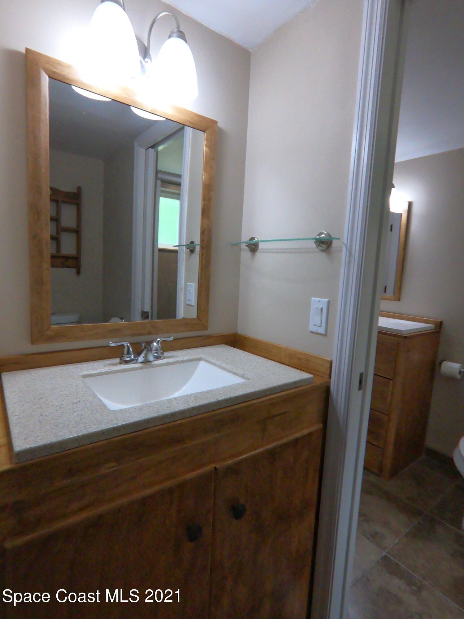 653 Ridge Club Drive, Unit 27 Melbourne, FL 32934 - Photo 12 of 31 Half Bath