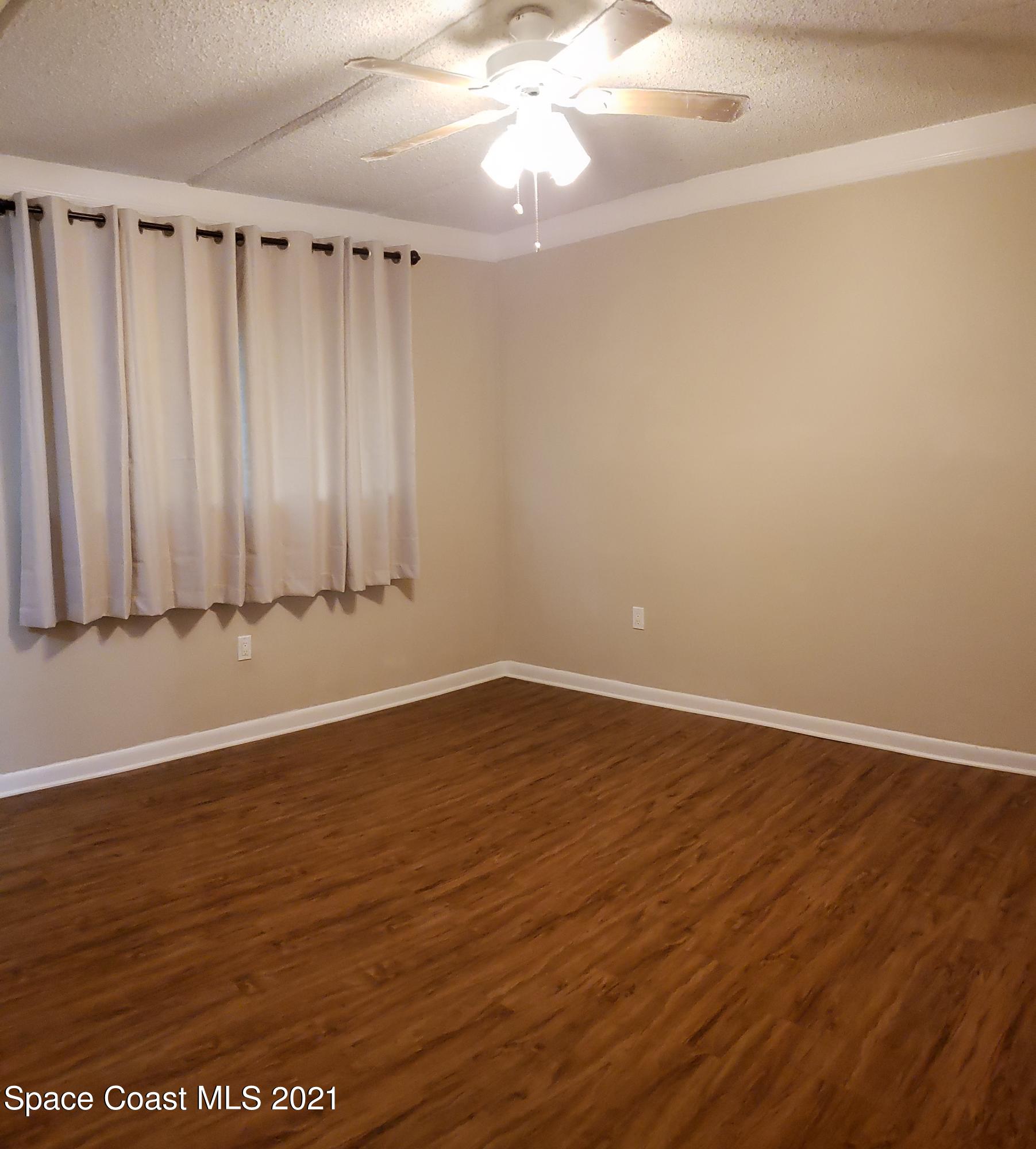 653 Ridge Club Drive, Unit 27 Melbourne, FL 32934 - Photo 16 of 31 Master Bedroom