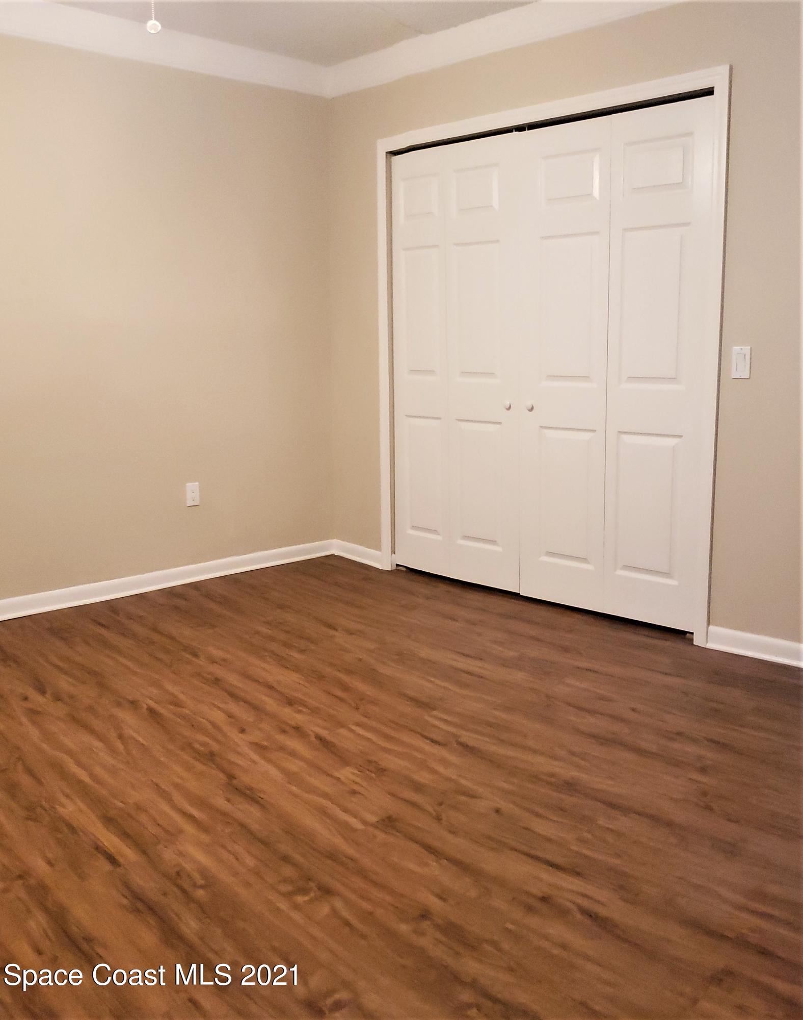 653 Ridge Club Drive, Unit 27 Melbourne, FL 32934 - Photo 17 of 31 Master Bedroom