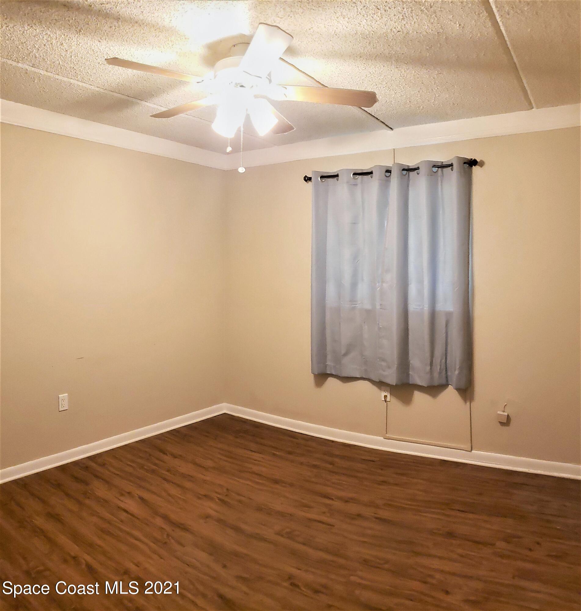 653 Ridge Club Drive, Unit 27 Melbourne, FL 32934 - Photo 18 of 31 Second Bedroom