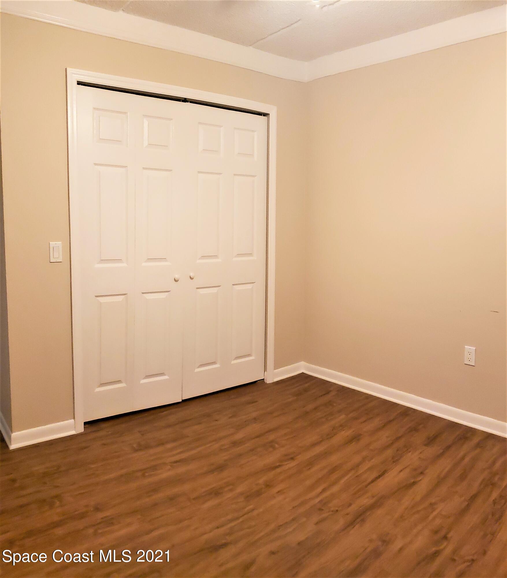 653 Ridge Club Drive, Unit 27 Melbourne, FL 32934 - Photo 19 of 31 Second Bedroom