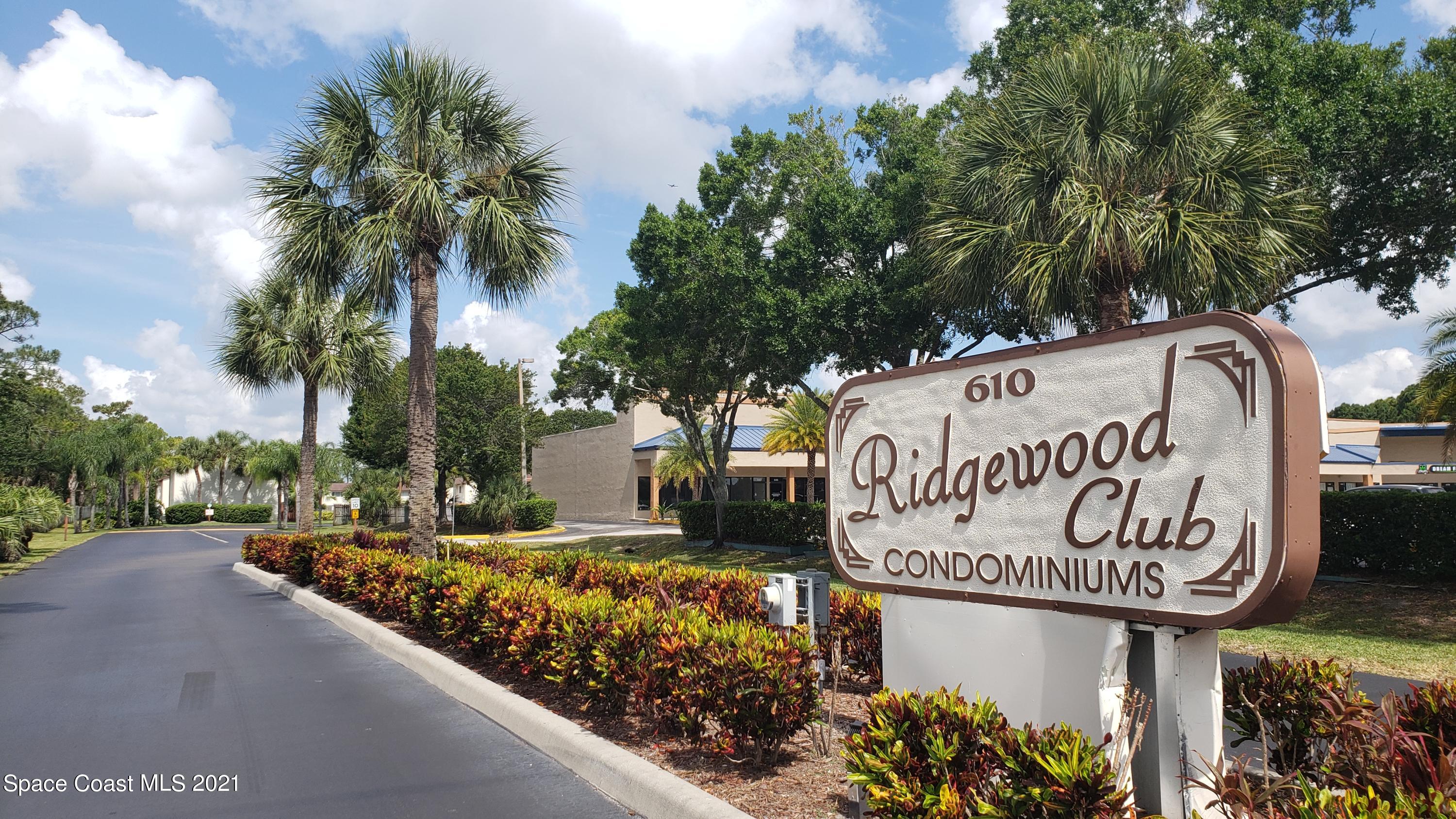 653 Ridge Club Drive, Unit 27 Melbourne, FL 32934 - Photo 30 of 31 Complex Entry