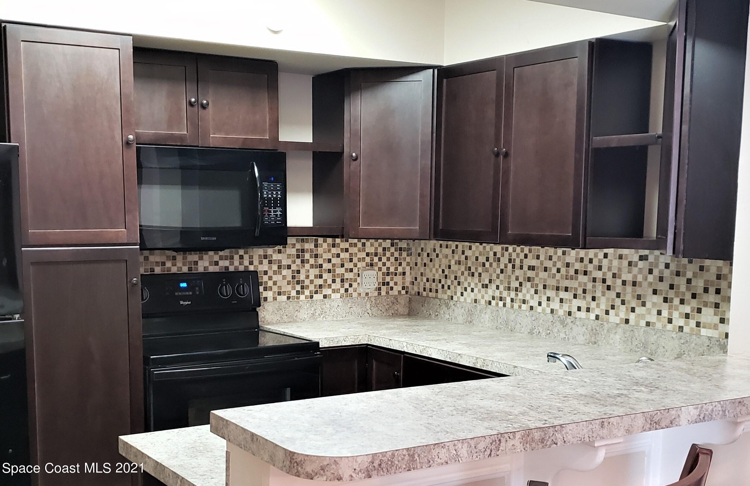 653 Ridge Club Drive, Unit 27 Melbourne, FL 32934 - Photo 4 of 31 Kitchen