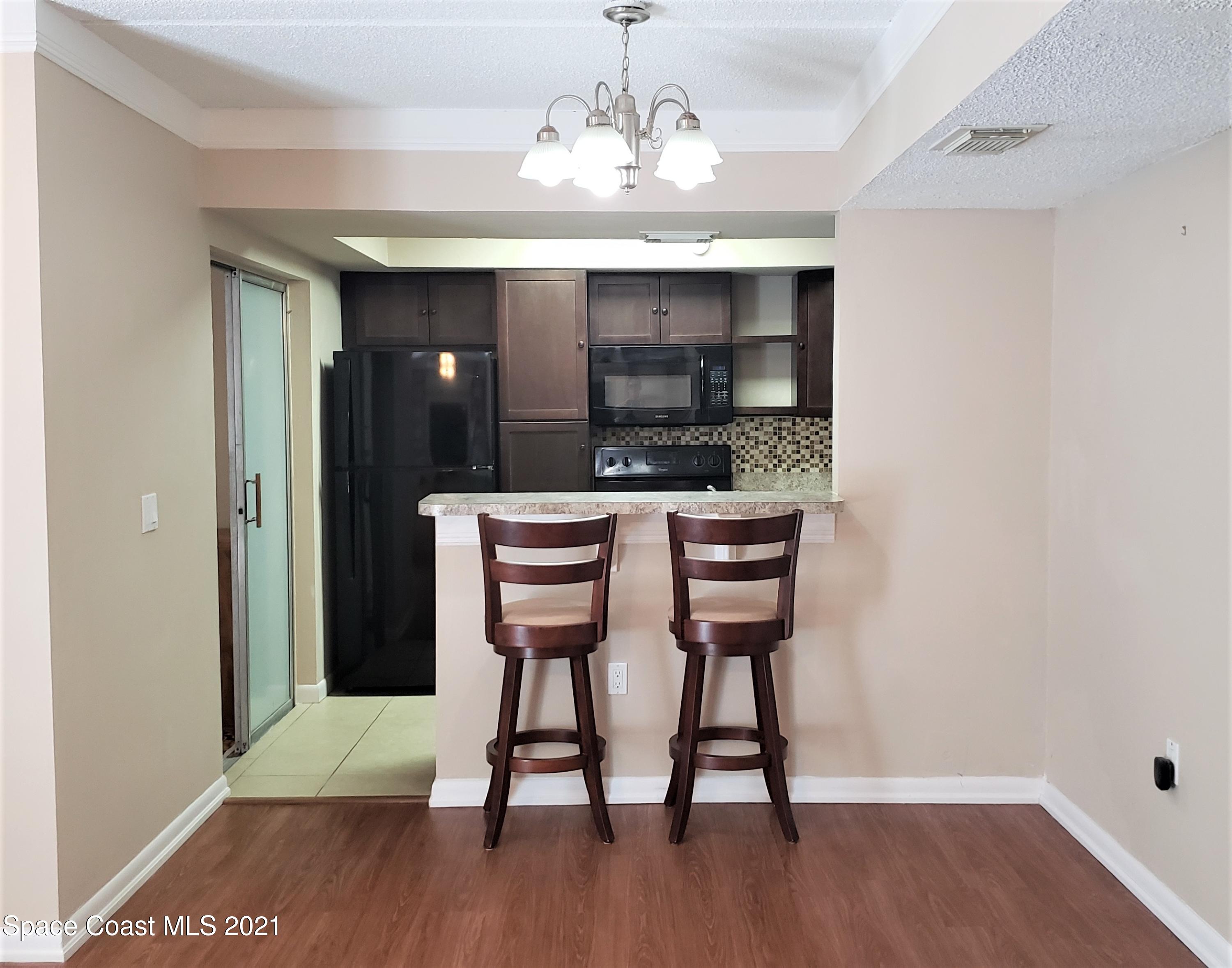 653 Ridge Club Drive, Unit 27 Melbourne, FL 32934 - Photo 5 of 31 Breakfast Bar