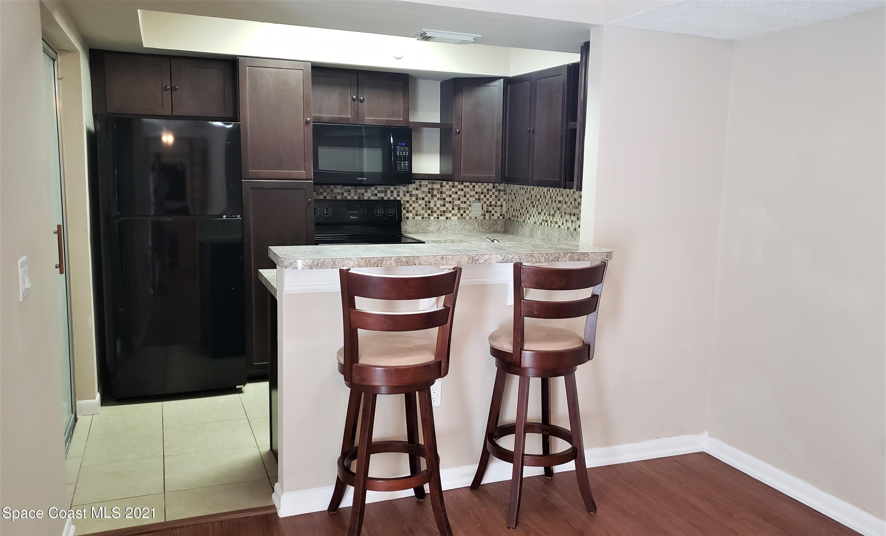 653 Ridge Club Drive, Unit 27 Melbourne, FL 32934 - Photo 6 of 31 Breakfast Bar