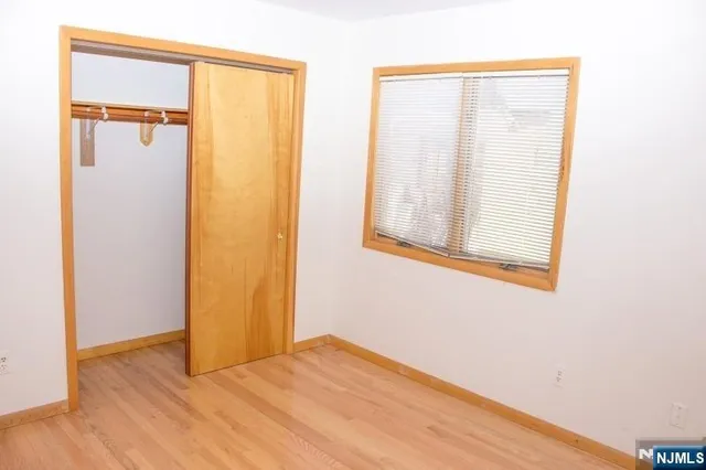 a view of a room that has a window in it