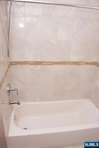 a bathroom with a bathtub