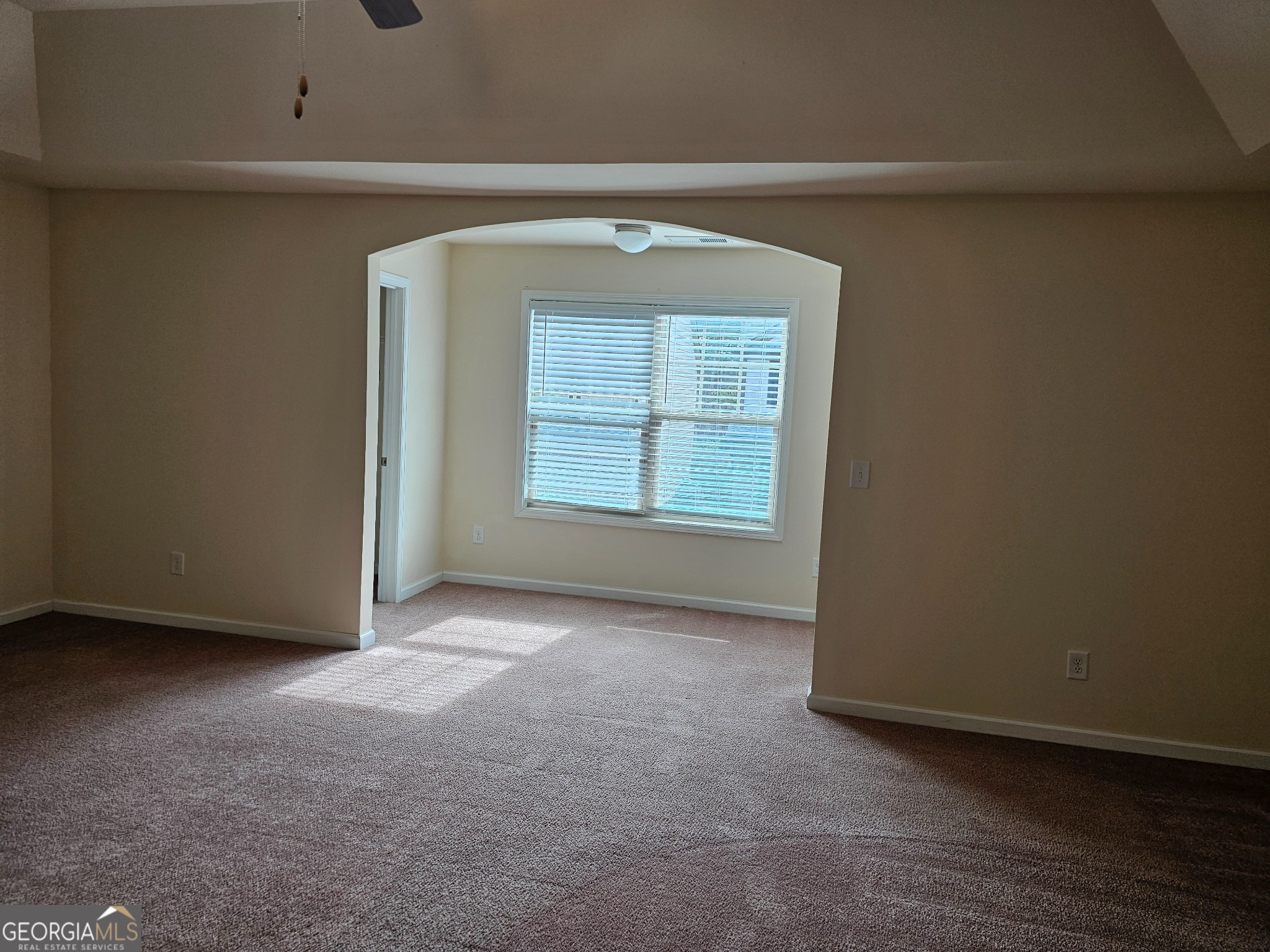 6509 Panasa Court Norcross, GA 30093 - Photo 3 of 16 an empty room with windows and closet