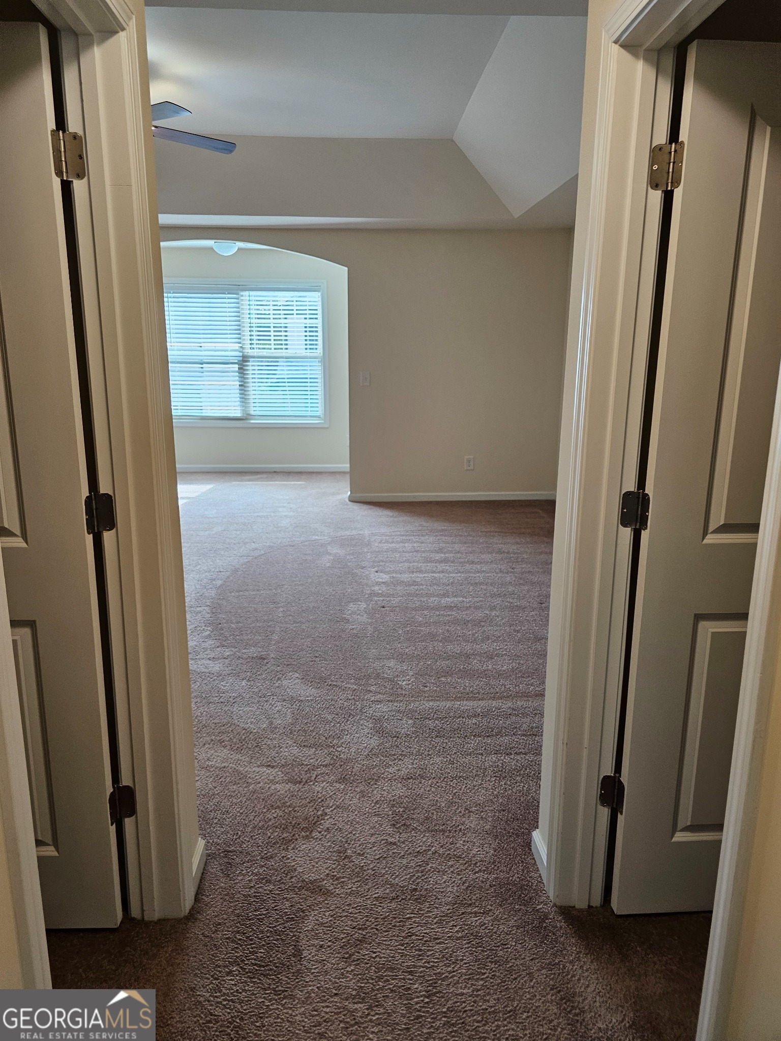 6509 Panasa Court Norcross, GA 30093 - Photo 4 of 16 an empty room with windows