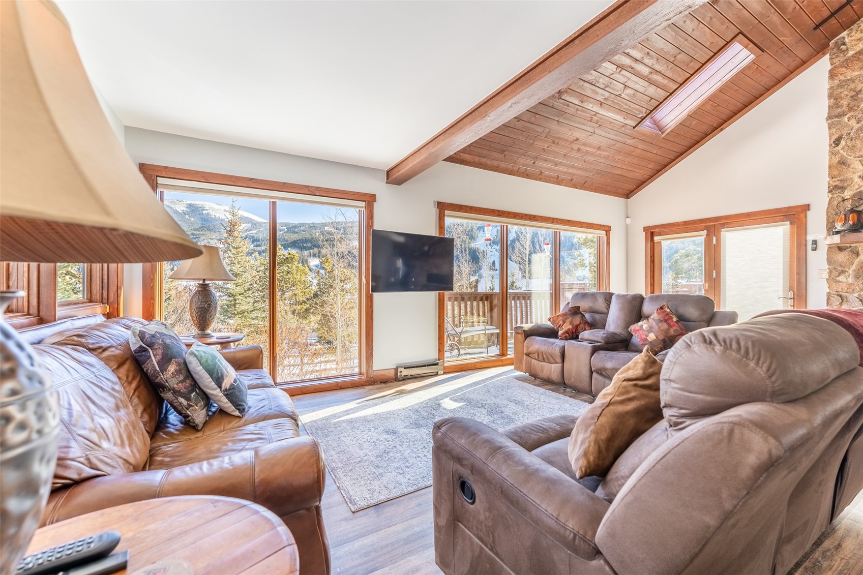 67 West Hansen Road Keystone, CO 80435 - Photo 3 of 42 Living room with beam ceiling