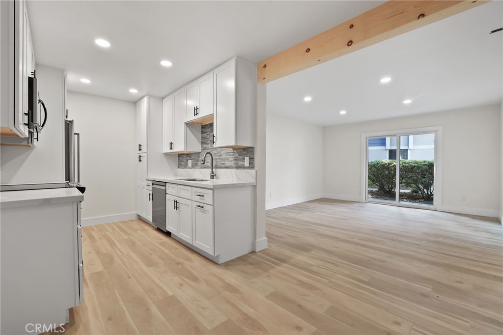 25611 Quail Run, Unit 63 Dana Point, CA 92629 - Photo 12 of 22 a view of kitchen with stainless steel appliances refrigerator oven cabinets and furniture
