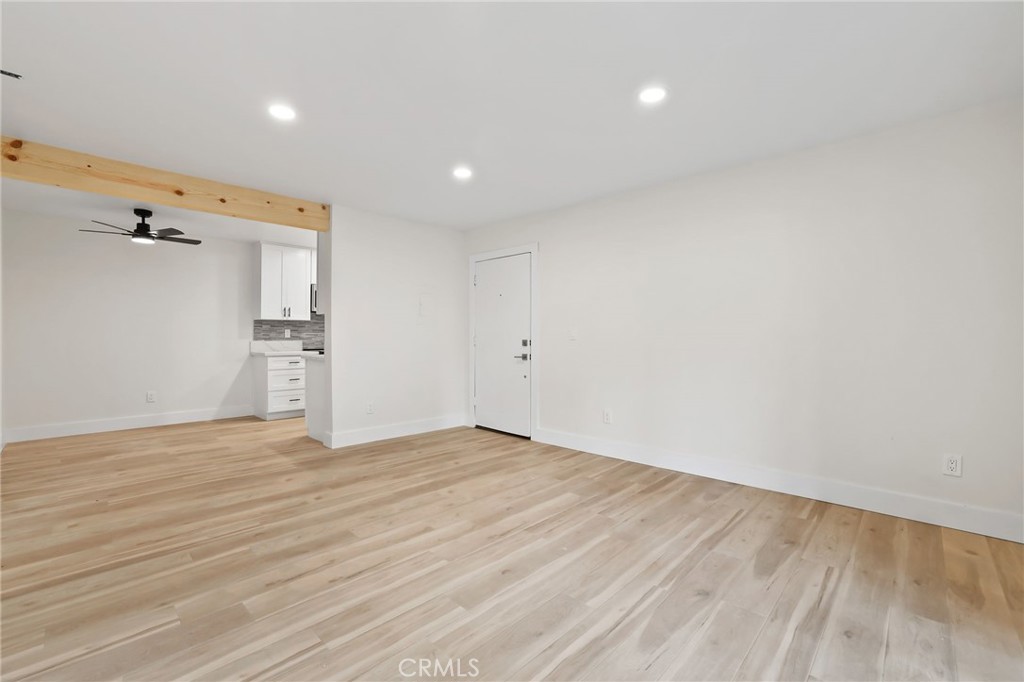 25611 Quail Run, Unit 63 Dana Point, CA 92629 - Photo 9 of 22 a view of empty room with wooden floor