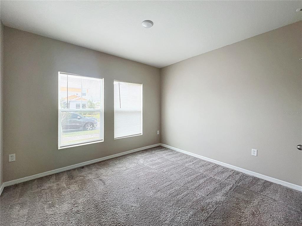 1404 Axel Circle Winter Haven, FL 33880 - Photo 13 of 21 an empty room with a window
