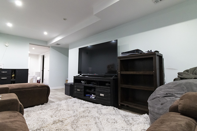 936 Chase Court Gurnee, IL 60031 - Photo 12 of 15 a living room with furniture and a flat screen tv