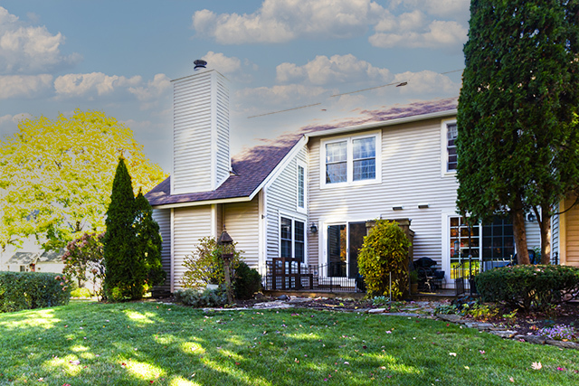 936 Chase Court Gurnee, IL 60031 - Photo 15 of 15 a front view of a house with a yard and potted plants