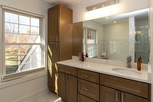 936 Chase Court Gurnee, IL 60031 - Photo 9 of 15 a bathroom with a sink and a mirror