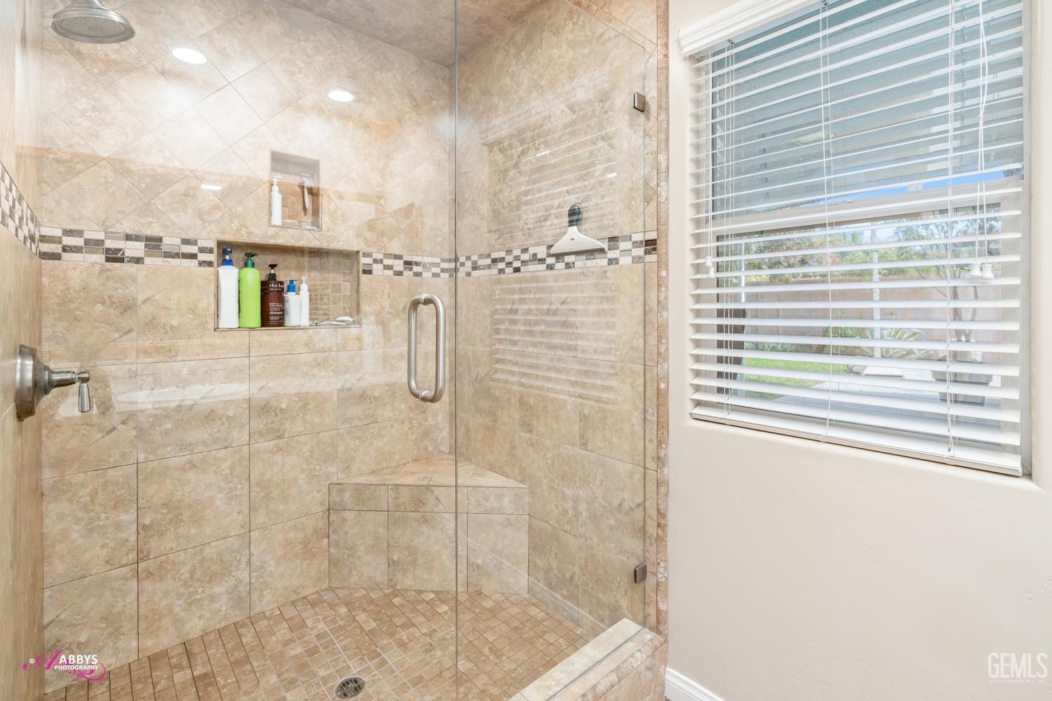 Undisclosed Address Bakersfield, CA 93312 - Photo 20 of 26 a bathroom with a shower